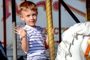 Boy-on-Merry-go-Round